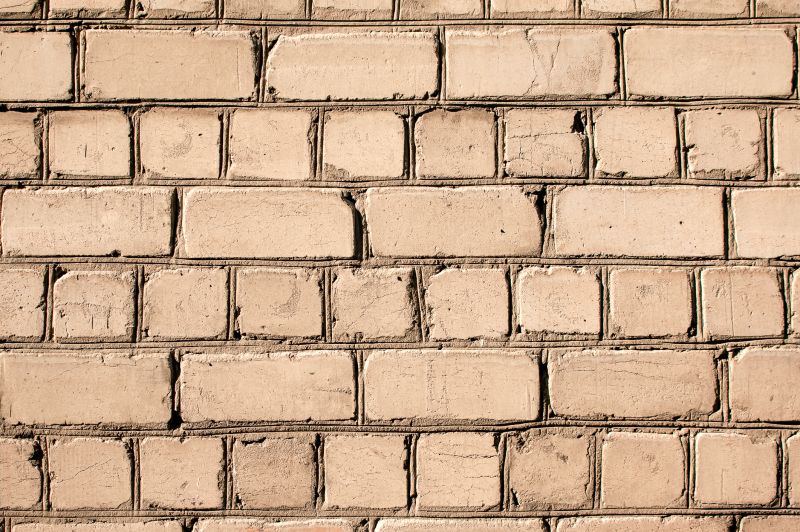 Brick Vs. Stone Tuckpointing: Key Differences For Commercial Projects